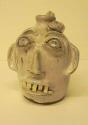 White face jug with snake