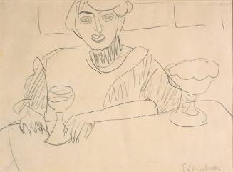 Woman Sitting at a Table