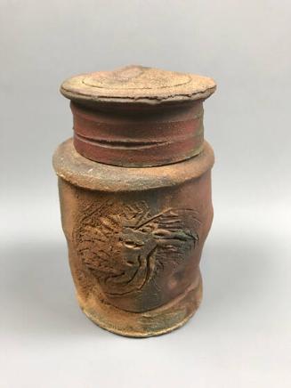 Covered jar with bird