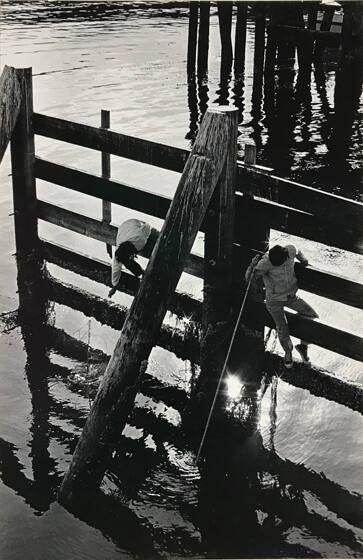 Spear fisherman on San Francisco docks