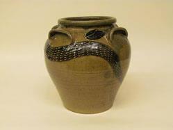 Pot with four handles and snake design