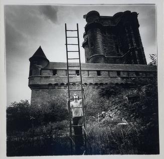 Man Climbing a Ladder, Paris, France

