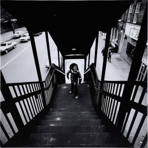 Boy in Mask on Subway Stairs, Bronx, NY
