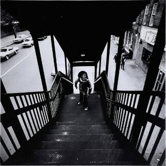 Boy in Mask on Subway Stairs, Bronx, NY
