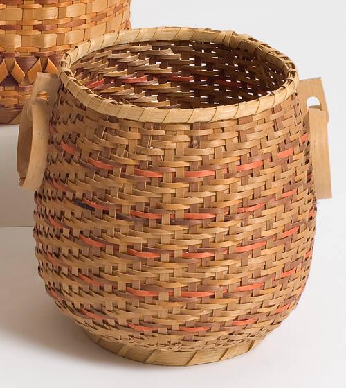 Basket with carved loop handles