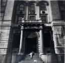 Older Man Lying on Stairs of Closed Police Station, NY, NY
