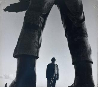 Old Man and Giant Statue, Brooklyn, NY
