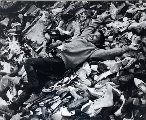 Boy on Pile of Shoes, Queens, NY
