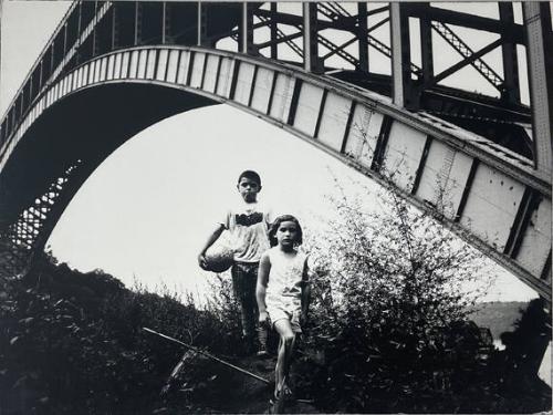 Brother and Sister Under Henry Hudson Bridge, Sputer Duvill, Bronx, NY
