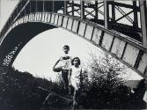 Brother and Sister Under Henry Hudson Bridge, Sputer Duvill, Bronx, NY
