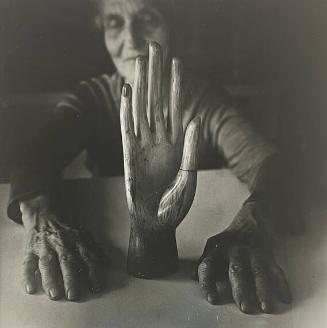 Old Woman with a Wooden Hand
