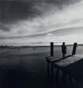 A Portuguese Fisherman's Wife Stands on the Pier Awaiting the Return of Her Husband, Cape Cod, MA
