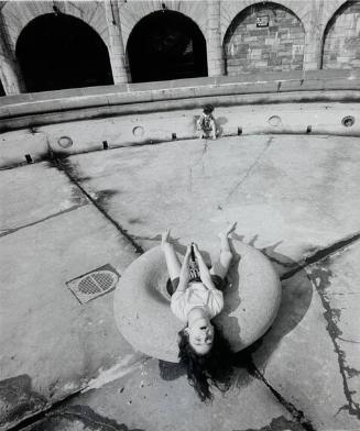 Girls Playing in Dry Fountain, NY
