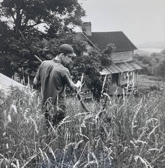 Young Man Cutting Grass, NC