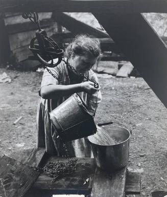 Mrs.Stella Smith Pouring Water into Well, Vicco, KY