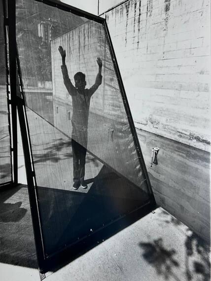 Boy Under Screen, Caracas, Ven
