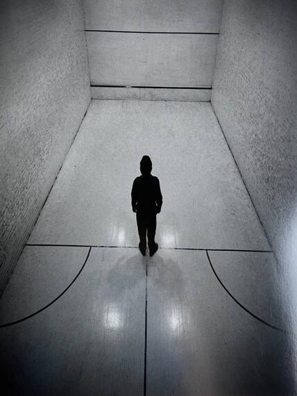 Boy in Racquet Ball Court, NY
