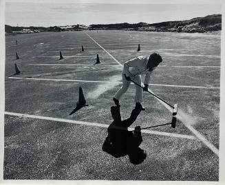 Man Sweeping Parking Lots, Queens, NY
