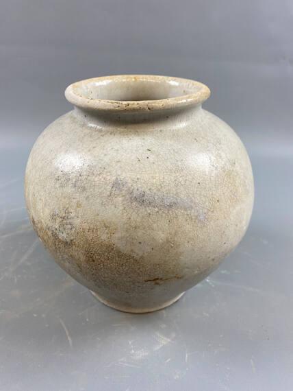 White Glazed Pottery Jar
