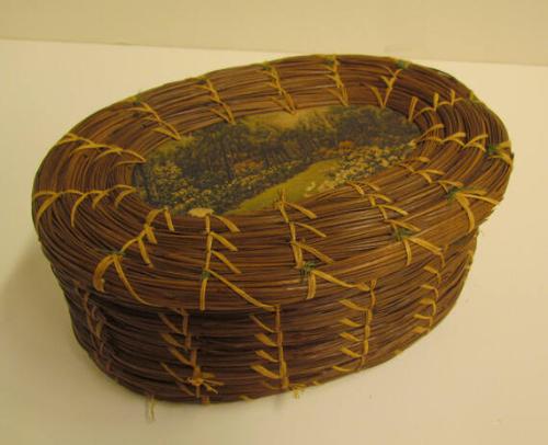 Pine straw basket with applied garden scene on lid