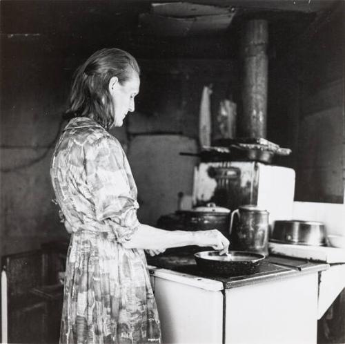 Mrs.Boone Working at Her Stove, Boone, WC