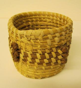 Gullah coil basket wine coaster studded with groups of three pine needle knots