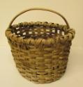 Splint basket with arched wooden handle