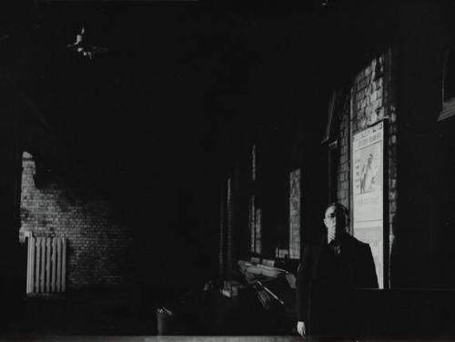 untitled (Man in brick alleyway)