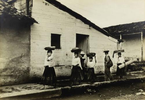 Guatemala (women carrying baskets)