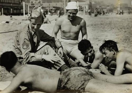 Gunners from England (sitting on beach)