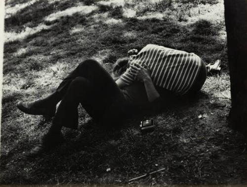 untitled (couple embracing on the grass)