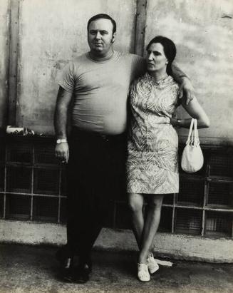untitled (couple, man with arm around woman holding purse)
