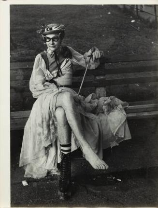 untitled (man in drag on bench in park)