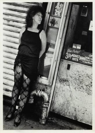 untitled (prostitute in front of adult store)
