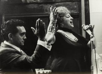 untitled (singing into microphone)