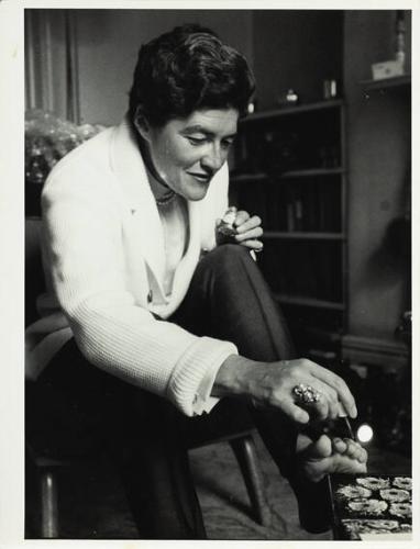 Nancy Spain (at her residence)