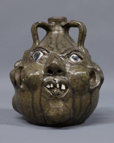 Three-sided face jug