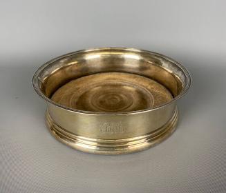 Wine bottle coaster