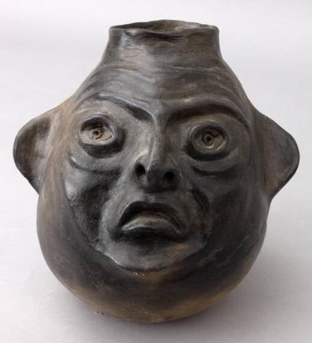 "Crooked Banker" Face jug