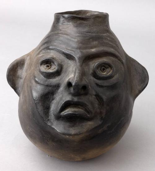 "Crooked Banker" Face jug