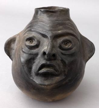 "Crooked Banker" Face jug