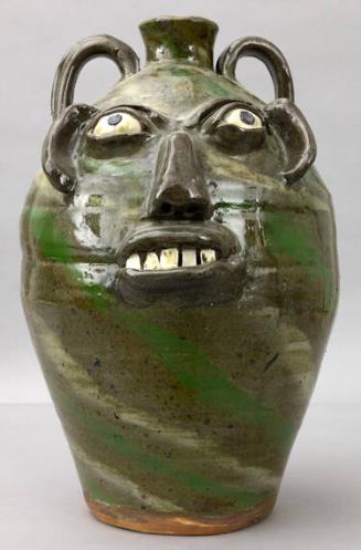 Face Jug with Swirls