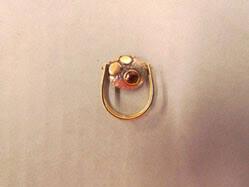 Ring with movable pendant