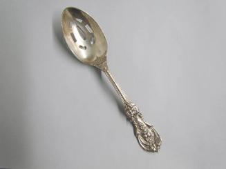 Pierced serving spoon