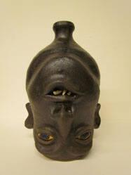 Upside-down face jug