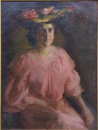 Portrait of a woman in a pink dress