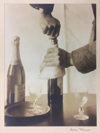 John Jacob Niles Opening a Bottle of Wine