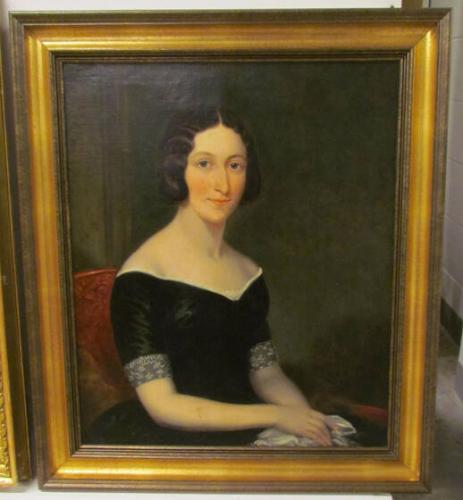 Portrait of a woman in a black dress