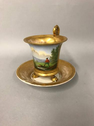 Cup with saucer