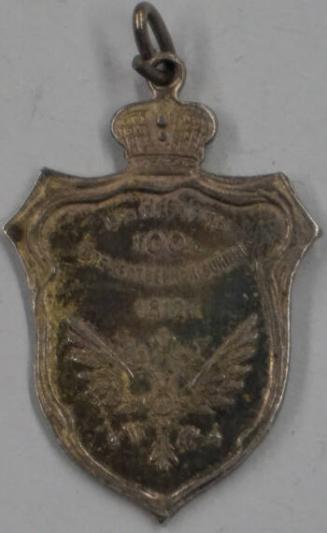 Medal in the form of a heraldic shield surmounted by an imperial crown celebrating a centennial